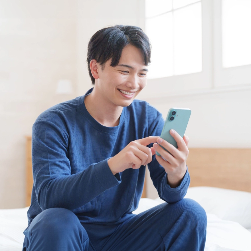 A man studying on his phone